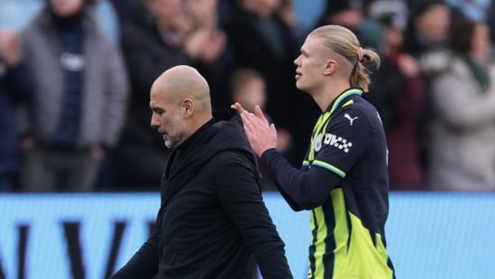 El técnico del Manchester City, Pep Guardiola, y Erling Haaland parecen abatidos después de un partido. (REUTERS)